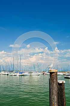 Small yachts in harbor in Desenzano, Garda lake, Italy