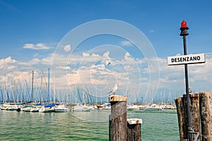 Small yachts in harbor in Desenzano, Garda lake, Italy