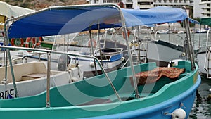 Small yachts in a harbour in a sunny day