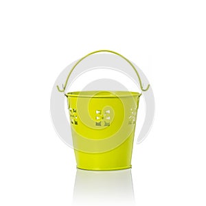 Small yellow vintage metal bucket. Studio shot isolated on white