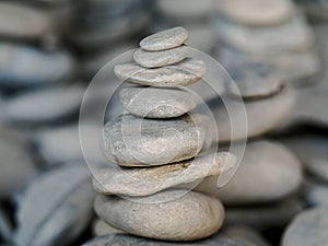 Small zen stones on each other in perfect balance and harmony
