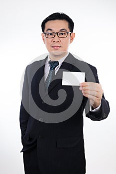 Smart Asian Chinese man wearing suit and holding blank card