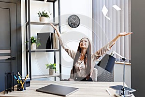 Smart business woman in formal suit outfit sitting and stretch relax in front of computer with happy and smile in modern office