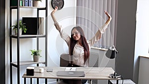 Smart business woman in formal suit outfit sitting and stretch relax in front of computer with happy and smile in modern office