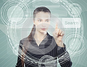 Smart business woman pointing to empty address bar in virtual web browser. Seo, internet marketing or distance learning concept