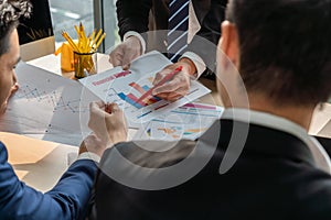 Smart businessman and businesswoman talking discussion in group meeting