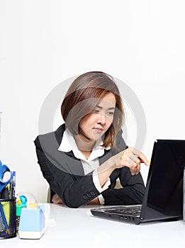 The smart businesswoman Asian working in office on the table