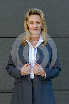 Smart businesswoman with long blond hair