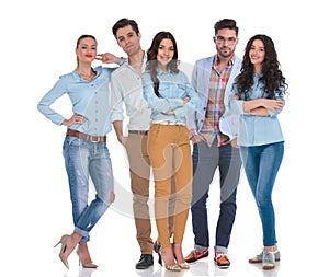 Smart casual group of five people standing