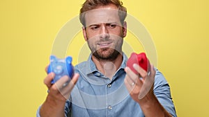 Smart casual man in blue denim shirt on yellow background