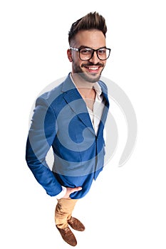 Smart casual man with hand in pocket listening to opinions