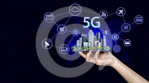 Smart city and 5G network wireless systems and internet of things, communication network with smartphone in hand and objects icon