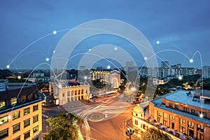 Smart city and wireless communication network concept. Digital network connection lines of Hanoi city. Hanoi opera house, old town