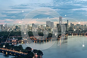 Smart city and wireless communication network concept. Digital network connection lines of Hanoi city at West Lake or Ho Tay