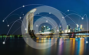 Smart city and wireless communication network concept. Digital network connection lines of Singapore at Marina Bay