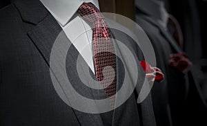 Smart dressed man standing in the mirror