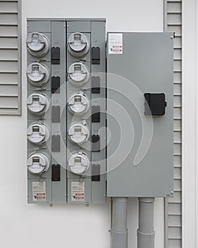 Smart electric utility meters for an apartment complex