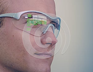 Smart glasses futuristic technology concept, man wear smart glasses with augmented reality to Managing field service and assembly,