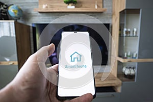 smart home app on smartphone. remote control of electronic devices in apartment. concept of controlling smart TV, electronics in