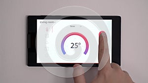 Smart home climate control device on a wall