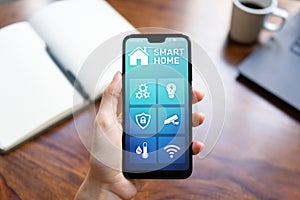 Smart home control application on mobile phone screen. Automation and iot concept.