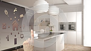 Smart home control concept, hand controlling digital interface from mobile app. Blurred background showing modern kitchen, archite