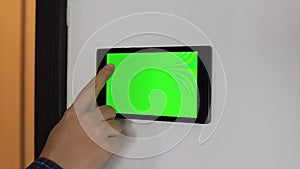 Smart home control device on a wall