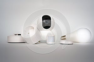 Smart home devices system. Seurity camera and automation sensor.