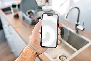 Smart home smartphone mockup screen in front of kitchen sink