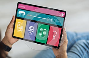 Smart home software on digital tablet screen, closeup