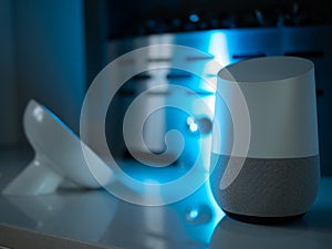 Smart home speaker device lit with colour changing LED lamp light - Cerulean Blue