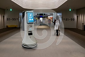 Smart hotel in hospitality industry 4.0  concept, the receptionist robot robot assistant  in lobby of hotel or airports always w photo