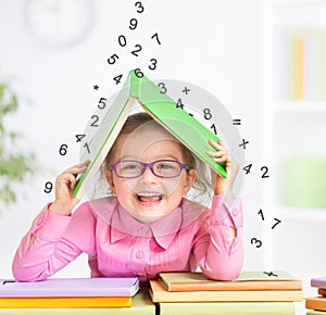 Smart kid in glasses under falling digits