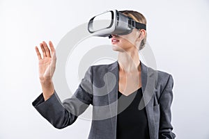 Smart leader touching at program or working while using VR glasses. Contraption.