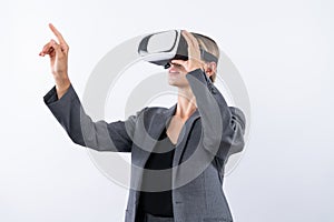 Smart leader touching at program or working while using VR glasses. Contraption.