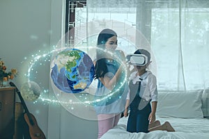 Smart learning with augmented mixed virtual reality technology education concept, mother try to teach daughter by using artificial