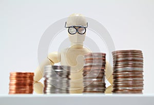Smart looking character looking at US Coins.