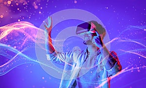 Smart man looking data or connecting with big data by using goggle. Deviation.