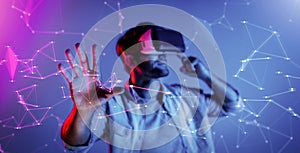 Smart man looking data or connecting with big data by using goggle. Deviation.