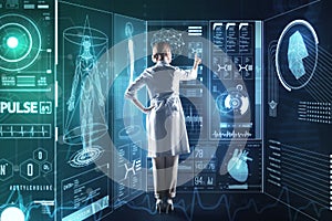 Smart medical worker using futuristic technologies while working at her research