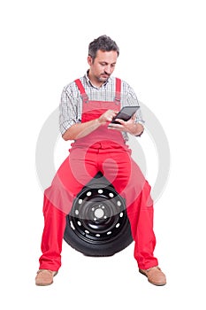 Smart and modern auto mechanic using tablet