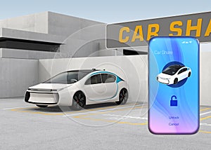 Smart phone with car sharing app in front of the white car