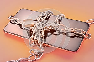 Smart phone in chain with lock on orange background with selective focus