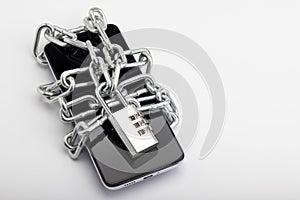 Smart phone and combination key code locked with metal chain on white background , Personal Security and safety concept