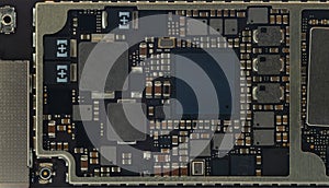 Smart phone components, circuit board from the modern mobile phone with CPU RAM chips and other electronic components