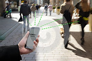 Smart phone with Corona Warn App, the contact tracking or tracing application against Covid 19 pandemic is connecting other phones