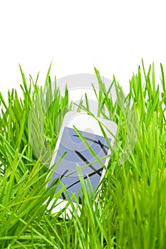 Smart phone in grass