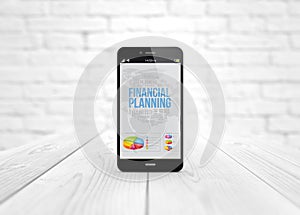 Smart phone over wooden table financial planning