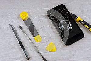 Smart phone repair with screwdriver