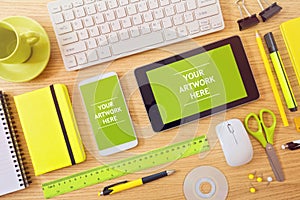 Smart phone and tablet mock up template on office desk. Can be used for app presentation and promotion